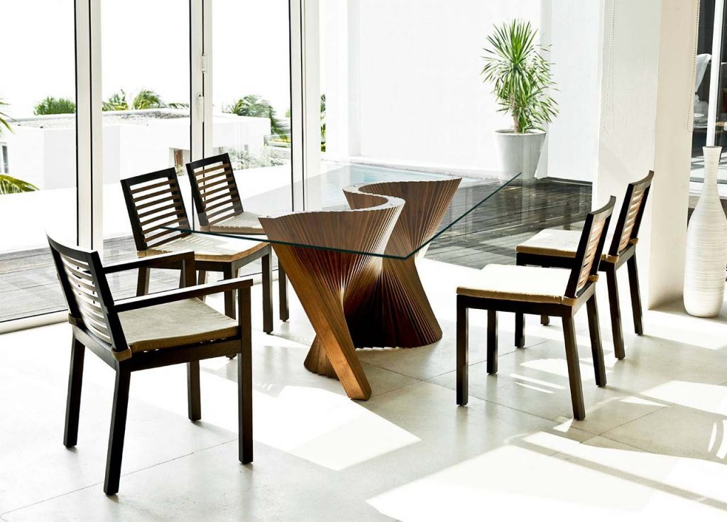 Wave dining table with glass top at IDUS